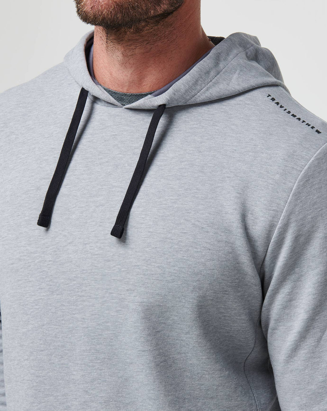 <img src="https://cdn.shopify.com/s/files/1/0252/0927/4404/files/TM-Combo-Logo-Block-Black-650.png?v=1580931784" alt=" TravisMathew Brand logo" align="middle" style="border:0;"><p><p>Upgraded Tech Hoodie</p>