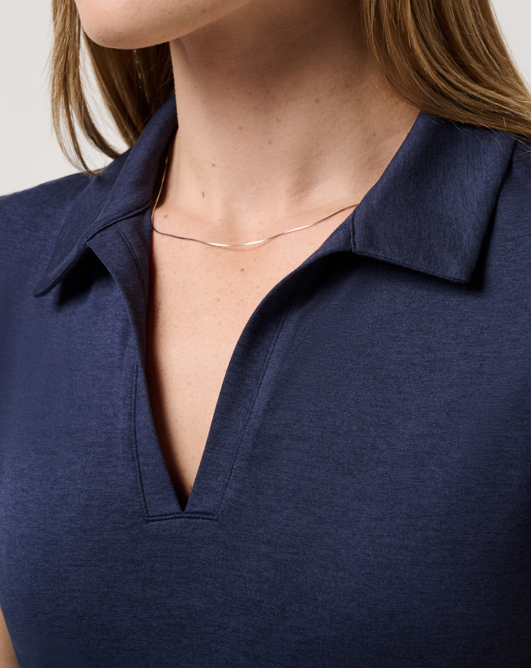 <img src="https://cdn.shopify.com/s/files/1/0252/0927/4404/files/TM-Combo-Logo-Block-Black-650.png?v=1580931784" alt=" TravisMathew Brand logo" align="middle" style="border:0;"><p><p>Skyloft Light SS Polo</p>