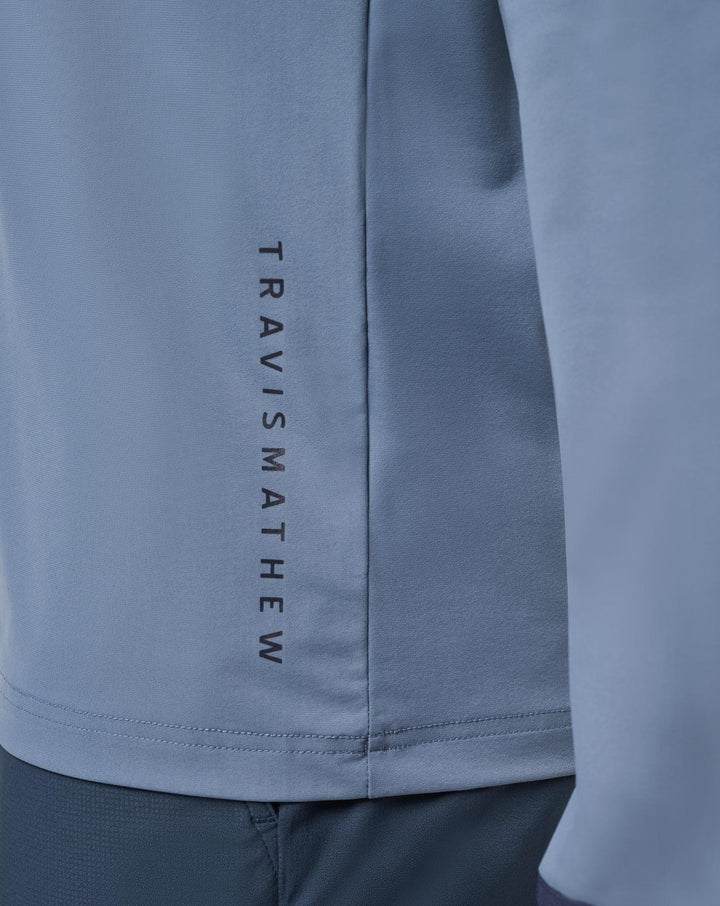 <img src="https://cdn.shopify.com/s/files/1/0252/0927/4404/files/TM-Combo-Logo-Block-Black-650.png?v=1580931784" alt=" TravisMathew Brand logo" align="middle" style="border:0;"><p><p>Hero Hour Tech Hoodie</p>