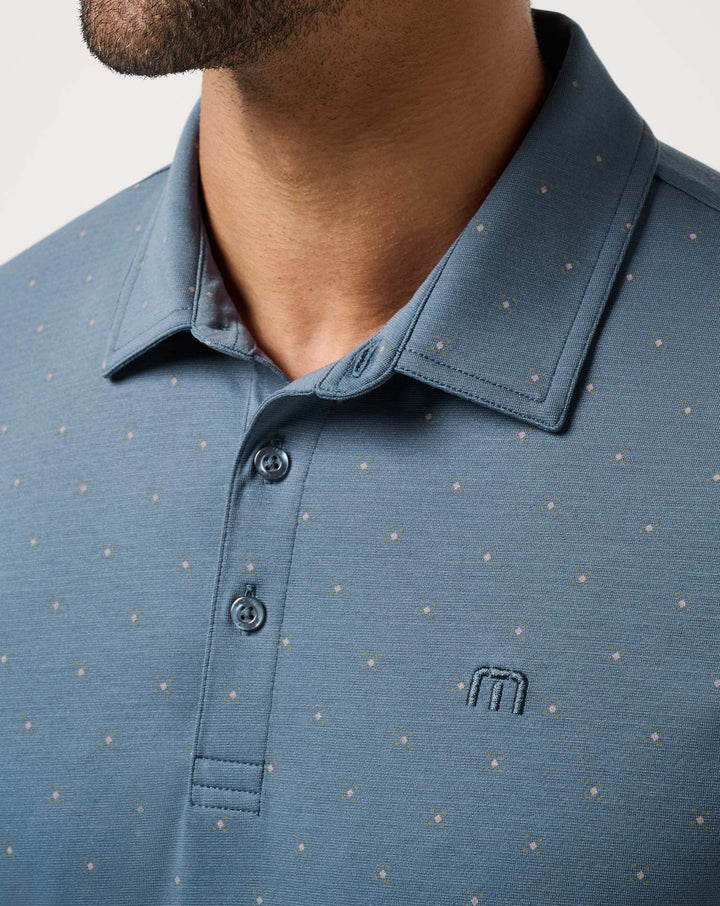 <img src="https://cdn.shopify.com/s/files/1/0252/0927/4404/files/TM-Combo-Logo-Block-Black-650.png?v=1580931784" alt=" TravisMathew Brand logo" align="middle" style="border:0;"><p><p>Performance Jersey Wave</p>