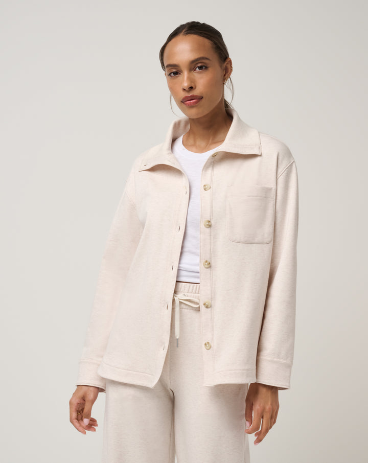 <img src="https://cdn.shopify.com/s/files/1/0252/0927/4404/files/TM-Combo-Logo-Block-Black-650.png?v=1580931784" alt=" TravisMathew Brand logo" align="middle" style="border:0;"><p><p>Cloud Fleece Button Down Shacket</p>