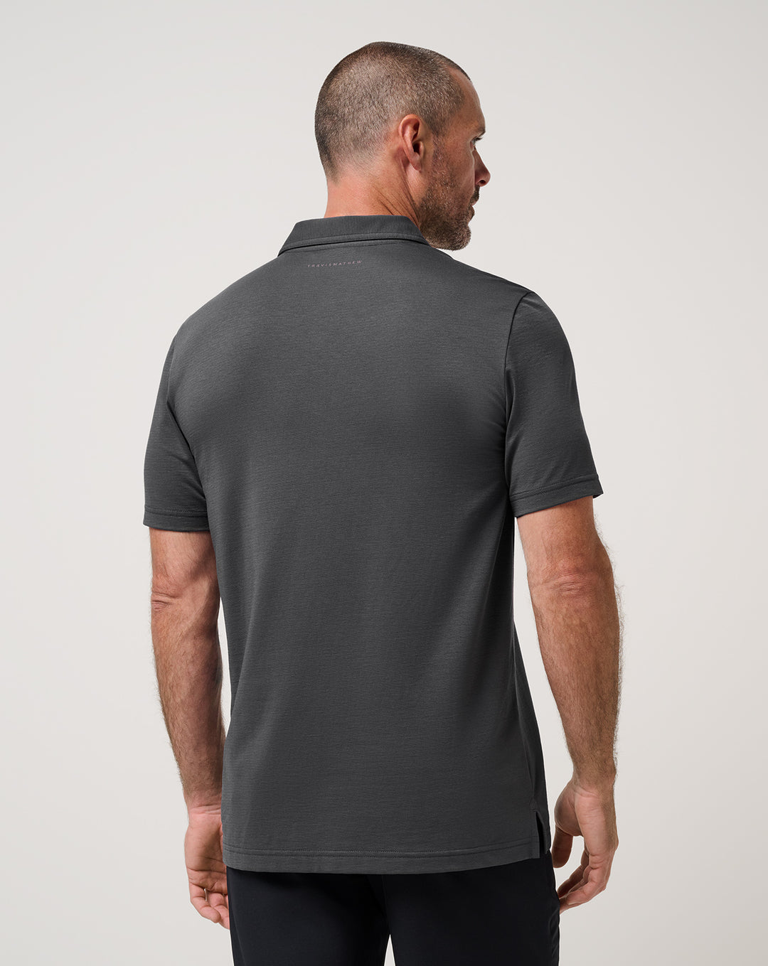 <img src="https://cdn.shopify.com/s/files/1/0252/0927/4404/files/TM-Combo-Logo-Block-Black-650.png?v=1580931784" alt=" TravisMathew Brand logo" align="middle" style="border:0;"><p><p>Performance Jersey Marina</p>